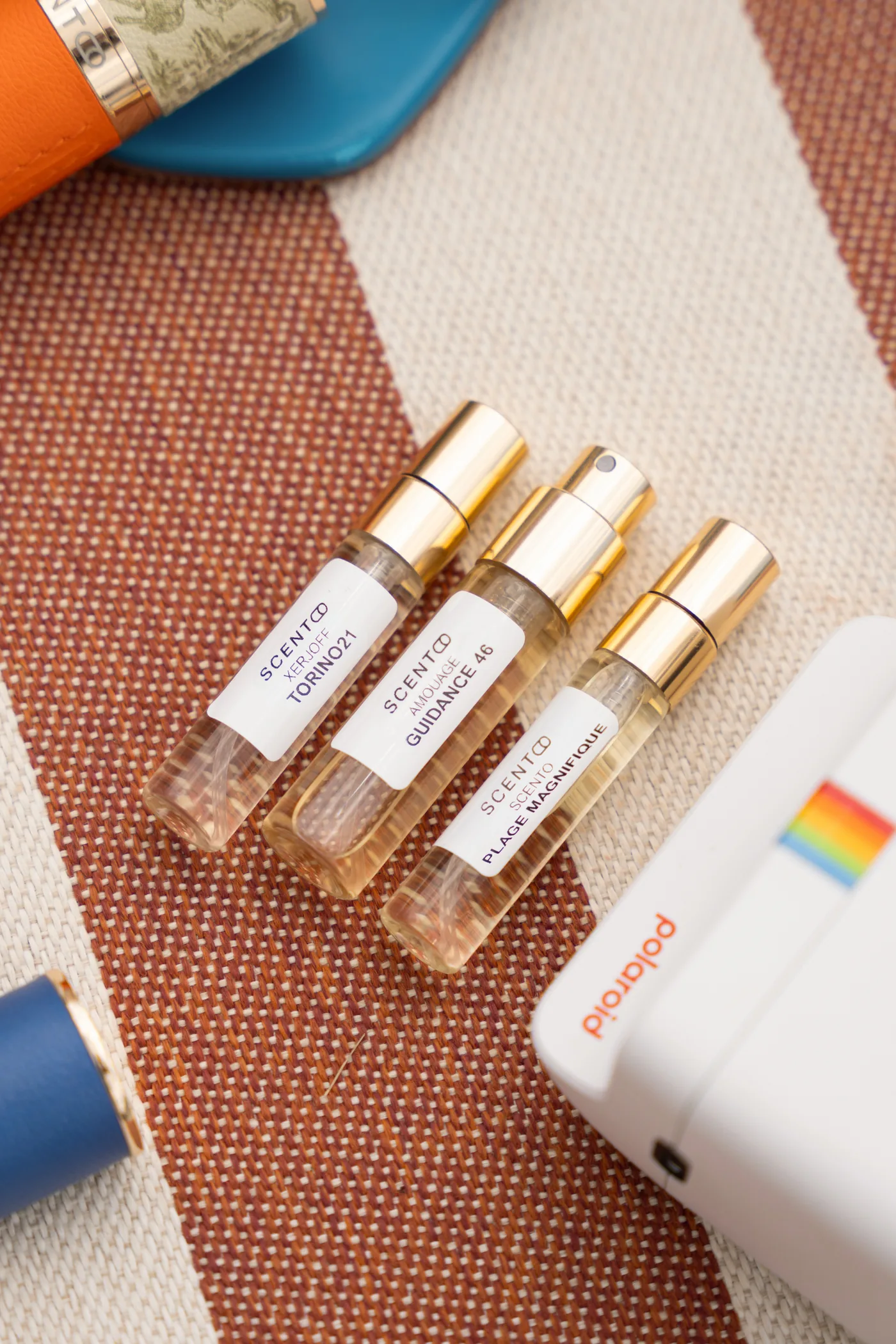 Scento travel-size perfume decants — authentic designer and niche fragrances